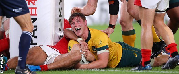 Michael Hooper celebrates confirmation of his try as Australia hit back