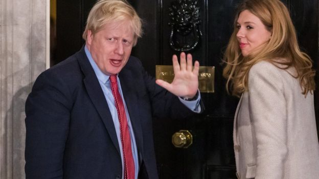 Prime Minister Boris Johnson and his partner Carrie Symonds arrive back in 10 Downing Street in London