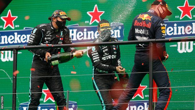 Hamilton, Bottas and Verstappen spray champagne on the podium