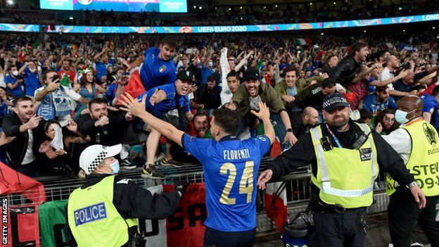 Italy fans celebrate their win at Wembley