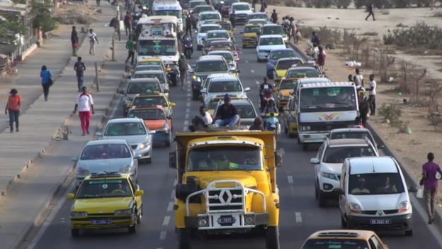 A road with traffic in Dakar, Senegal