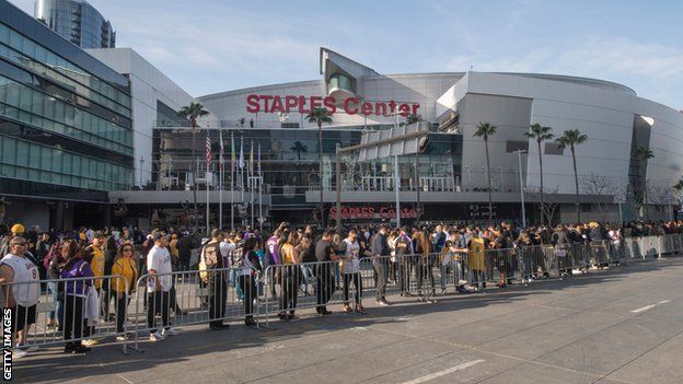 Thousands of Los Angeles Lakers fans line the streets outside the Staples Center during the Kobe and Gianna Bryant memorial service