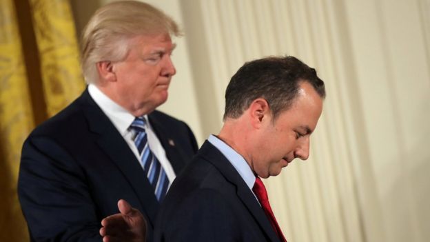 U.S. President Donald Trump congratulates White House Chief of Staff Reince Priebus during a swearing in ceremony for senior staff at the White House in Washington, U.S.