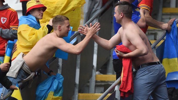 Ukraine and Wales fans swapped shirts after the final whistle in Cardiff to emulate their heroes on the pitch