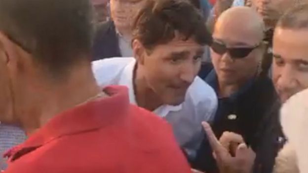 Screenshot of PM Justin Trudeau interacting with the heckler