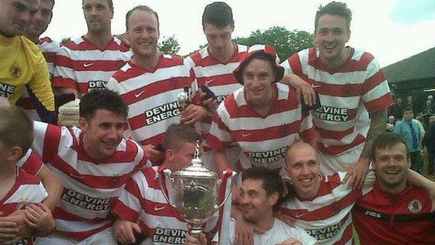 Shaun Woodburn (top right) celebrating East of Scotland cup victory with Bonnyrigg Rose