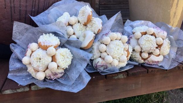 The four doughnut bouquets are laid out