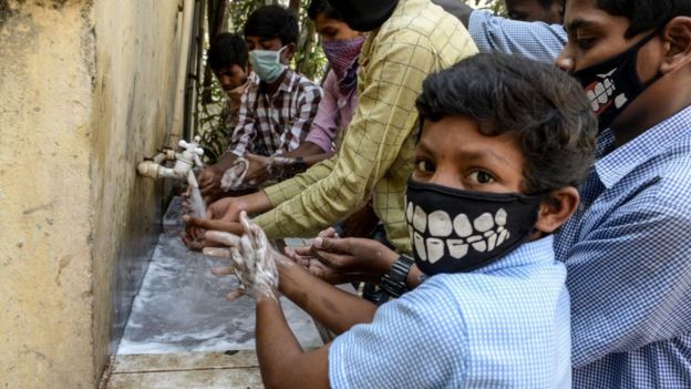 School children in India are washing their hands