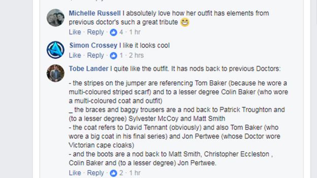 I quite like the outfit. It has nods back to previous Doctors: - the stripes on the jumper are referencing Tom Baker (because he wore a multi-coloured striped scarf) and to a lesser degree Colin Baker (who wore a multi-coloured coat and outfit)