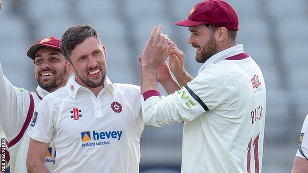 Simon Kerrigan celebrates a wicket for Northamptonshire against Lancashire