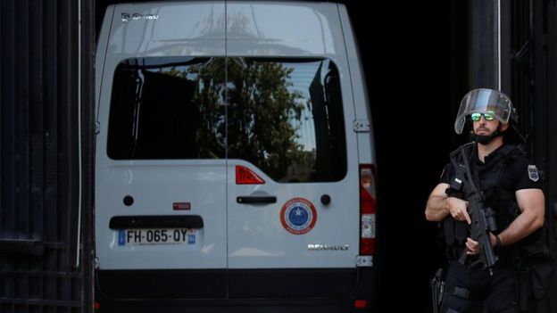 A police convoy believed to be carrying Rwandan genocide fugitive Felicien Kabuga arrives at the Paris courthouse