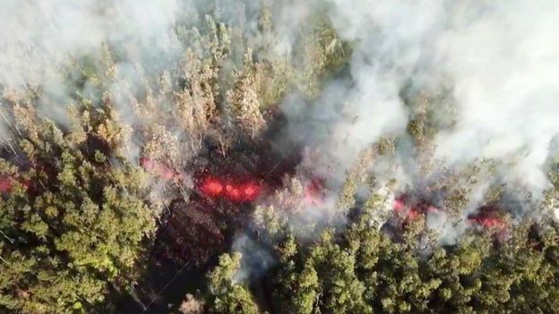 Lava emerges from the ground after Kilauea Volcano erupted, on Hawaii's Big Island on 3 May 2018, in this still image taken from video obtained from social media