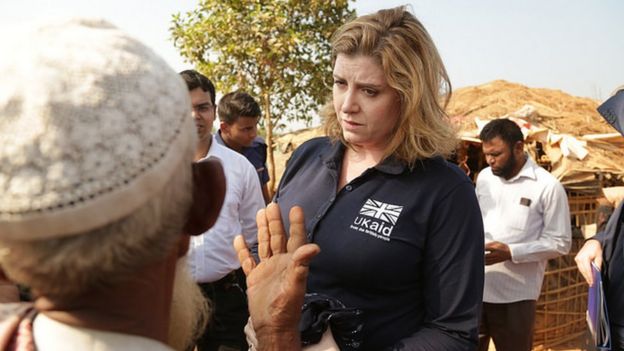 Penny Mordaunt talks to a Rohingya refugee in Kutapalong, near Cox's Bazar,