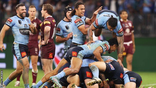 New South Wales players celebrate a try in game two of the 2022 State of Origin