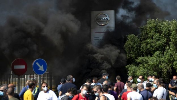 Protestors burned tyres in front of Nissan's plant in Barcelona which is being closed down