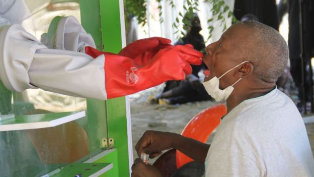 A patient who is suspected of suffering from COVID-19 coronavirus undergoes testing at the University of Maiduguri Teaching Hospital isolation centre on May 10, 2020