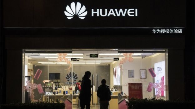 Customers entering a Huawei Technologies store on 29 January, 2019 in Beijing, China