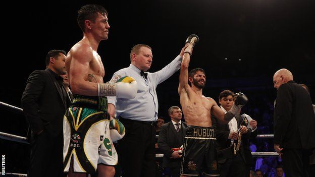 Linares is announced as winner as Anthony Crolla looks on