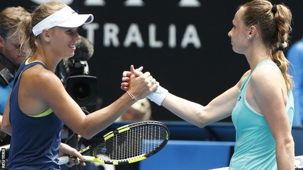 Caroline Wozniacki and Magdalena Rybarikova shake hands