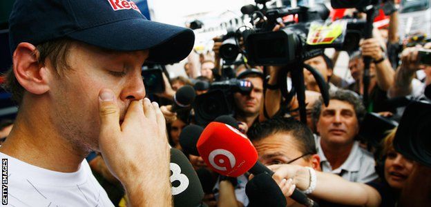 Sebastian Vettel faces the media after colliding with team-mate Mark Webber in Turkey in 2010