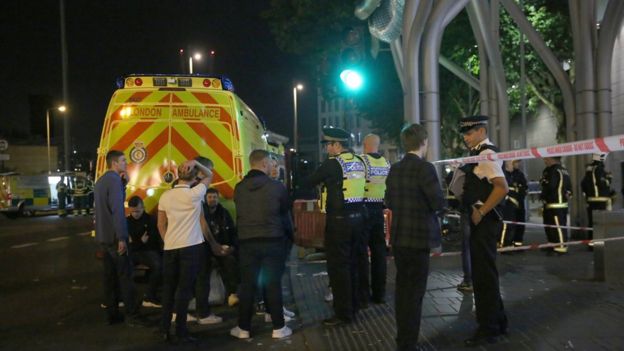 Police speaking to people outside Stratford Centre