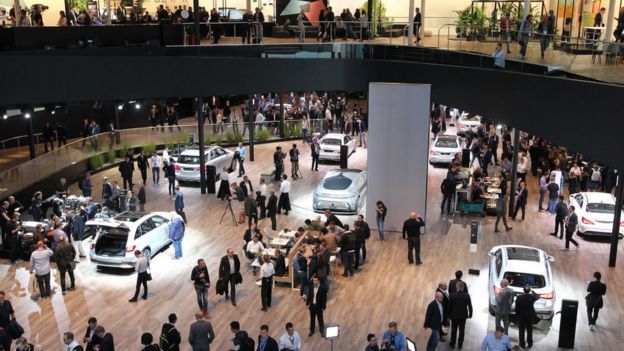 Spectators at the booth of German carmaker Mercedes at the 2017 Frankfurt Motor Show