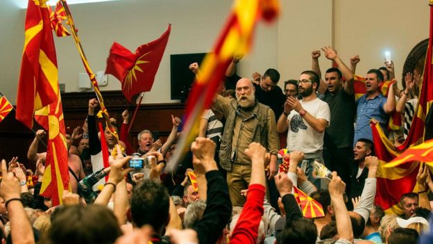 Many of the protesters brought Macedonia's national flag