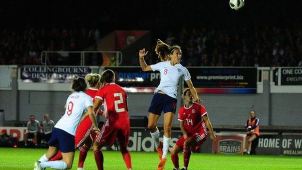 Jill Scott heads England's second goal