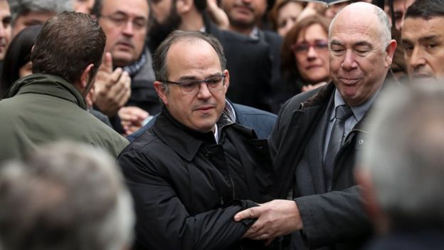 Catalan politician Jordi Turull returns to the Supreme Court during a break in proceedings as part of an investigation into Catalonia's banned bid for independence