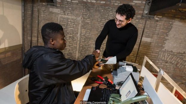 In Venice, NSK 'citizens' work to issue passports to new applicants, such as the author of this article