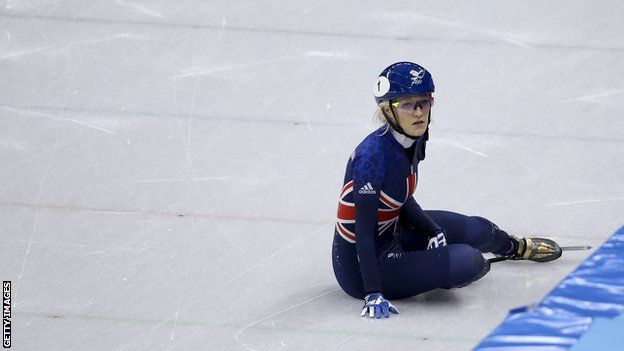 Elise Christie sits on the ice in Pyeongchang
