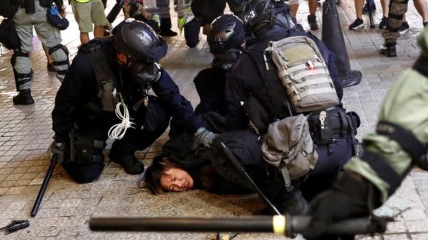 Police detain a demonstrator in Hong Kong. Photo: 31 August 2019