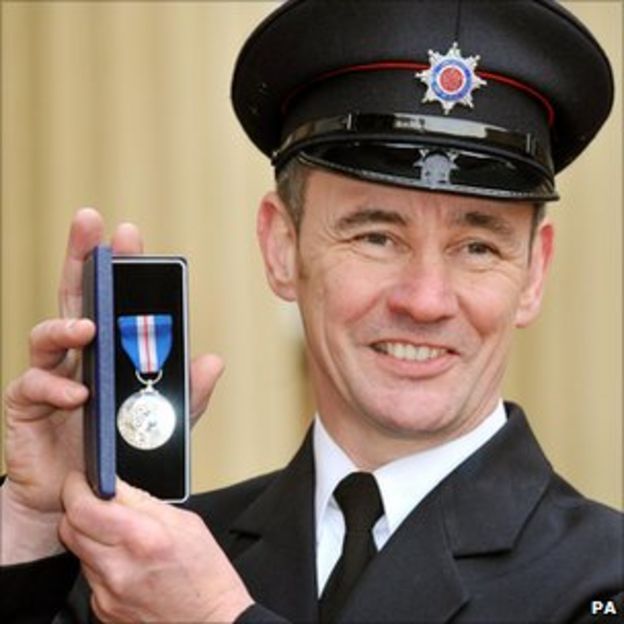 Queen honours Lancashire firefighter Dean Seaward - BBC News