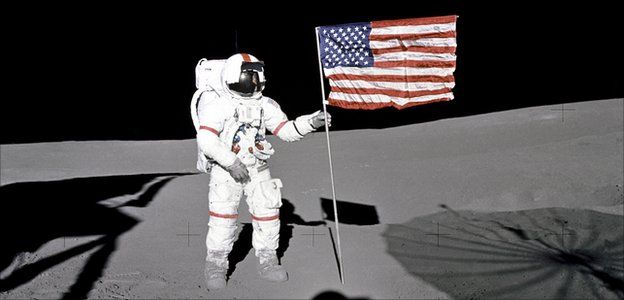 Alan Shepard plants a flag on the Moon