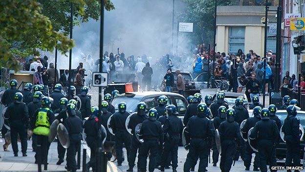 Confrontation between police and rioters in Hackney