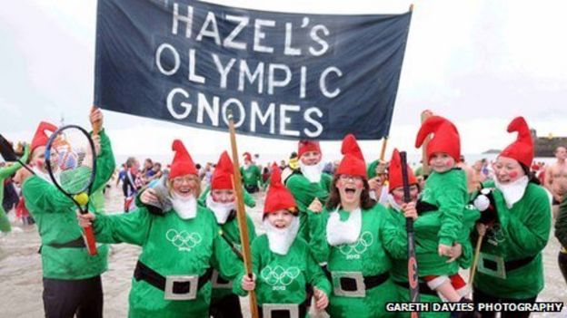 Saundersfoot New Year&#039;s Day swim&#039;s 1,657 record turnout - BBC News