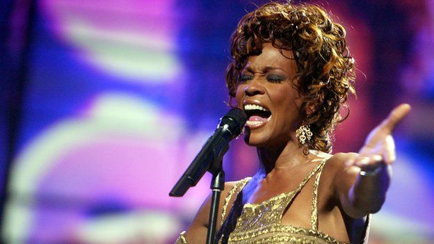 Whitney Houston performs in Las Vegas in 2004.