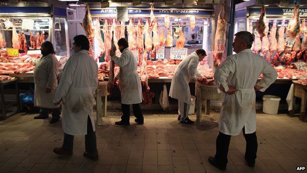 Butchers in the Omonia market district, Athens