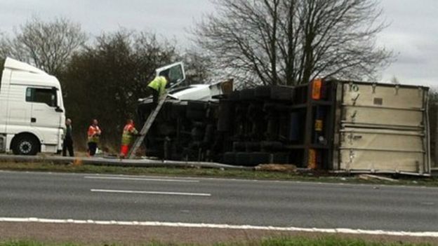 M6 Charnock Richard crash: Car trapped by tipped lorry - BBC News