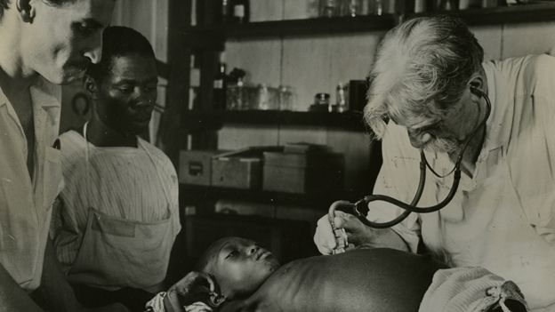 Albert Schweitzer examines a patient
