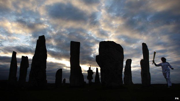 Commonwealth gold medallist Kirsty Wade took the flame to the Callanish Standing Stones as the sun rose