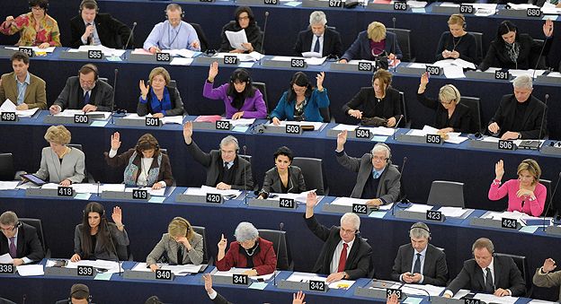 Members of the European Parliament take a vote during a sitting in Strasbourg