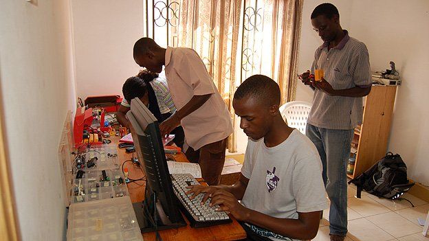 Students at work in Solomon King's home lab