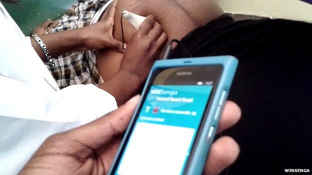 WinSenga app being used on a pregnant woman