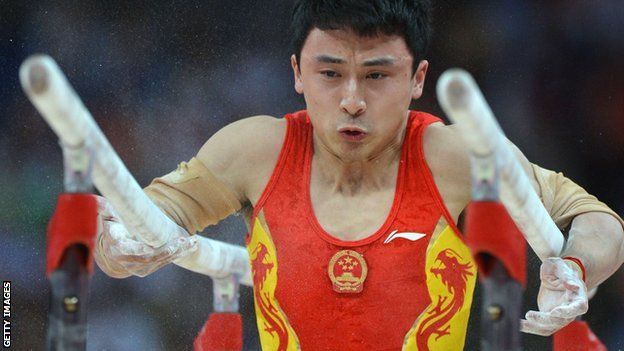 Olympics gymnastics: Feng Zhe of China swings to parallel bars gold ...