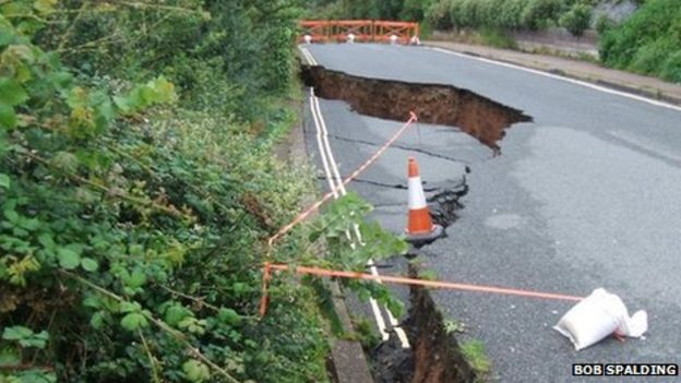 Seaton collapsed cliff road could 'put lives at risk' - BBC News