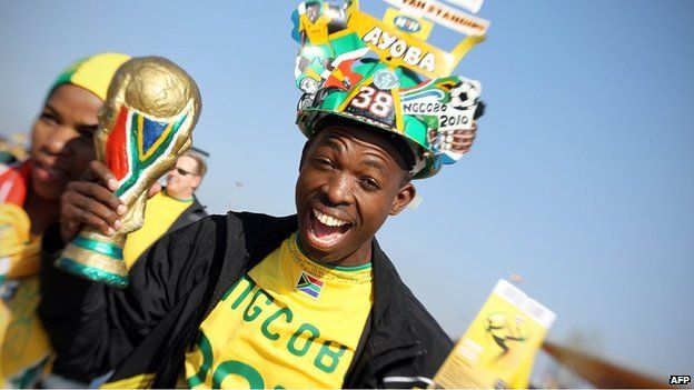 A South African football fan cheers as he waits for the opening ceremony of the 2010 football World Cup in June 2010