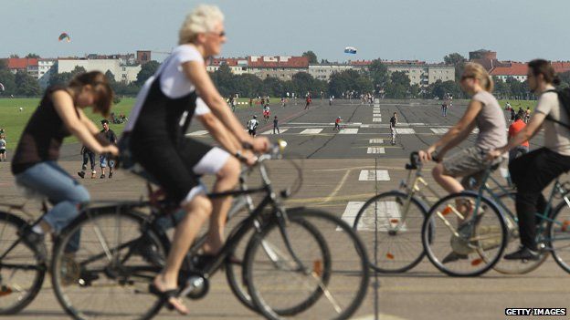 Cyclists at a former Berlin airport