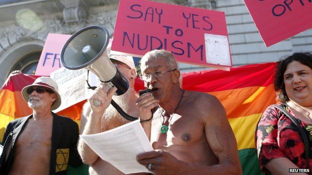 Nudists hold a rally in front of San Francisco city hall