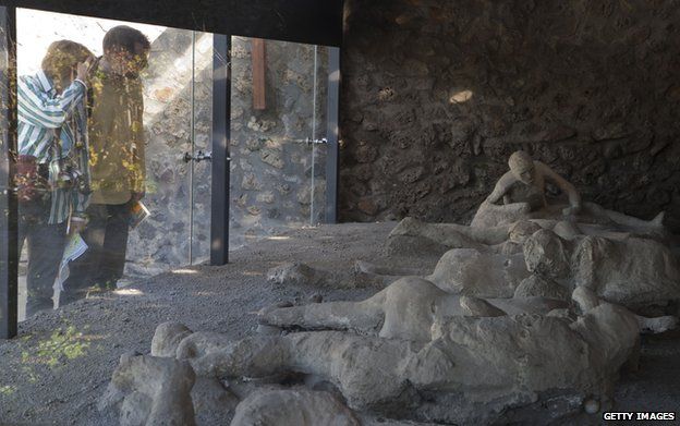 Casts of victims of the volcanic eruption on display in Pompeii